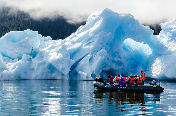 Blue iceberg and orange lifejackets