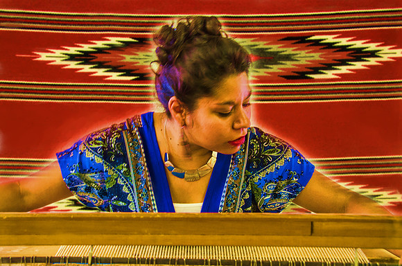 Rug weaver in Chimayo, New Mexico