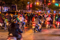 Motor scooters at night in Hanoi
