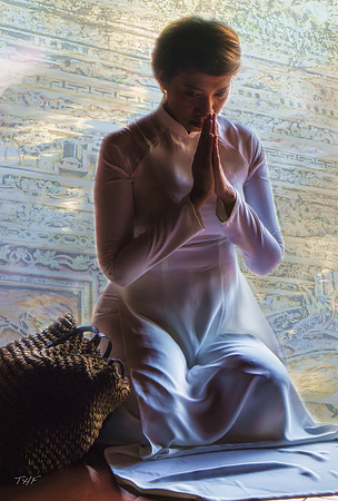At prayer in a Buddhist temple in Hue
