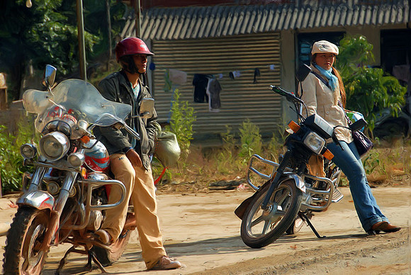 Bikers on break, rural Yunnan Province