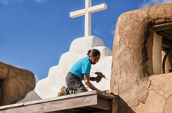Remudding the Taos Pueblo church